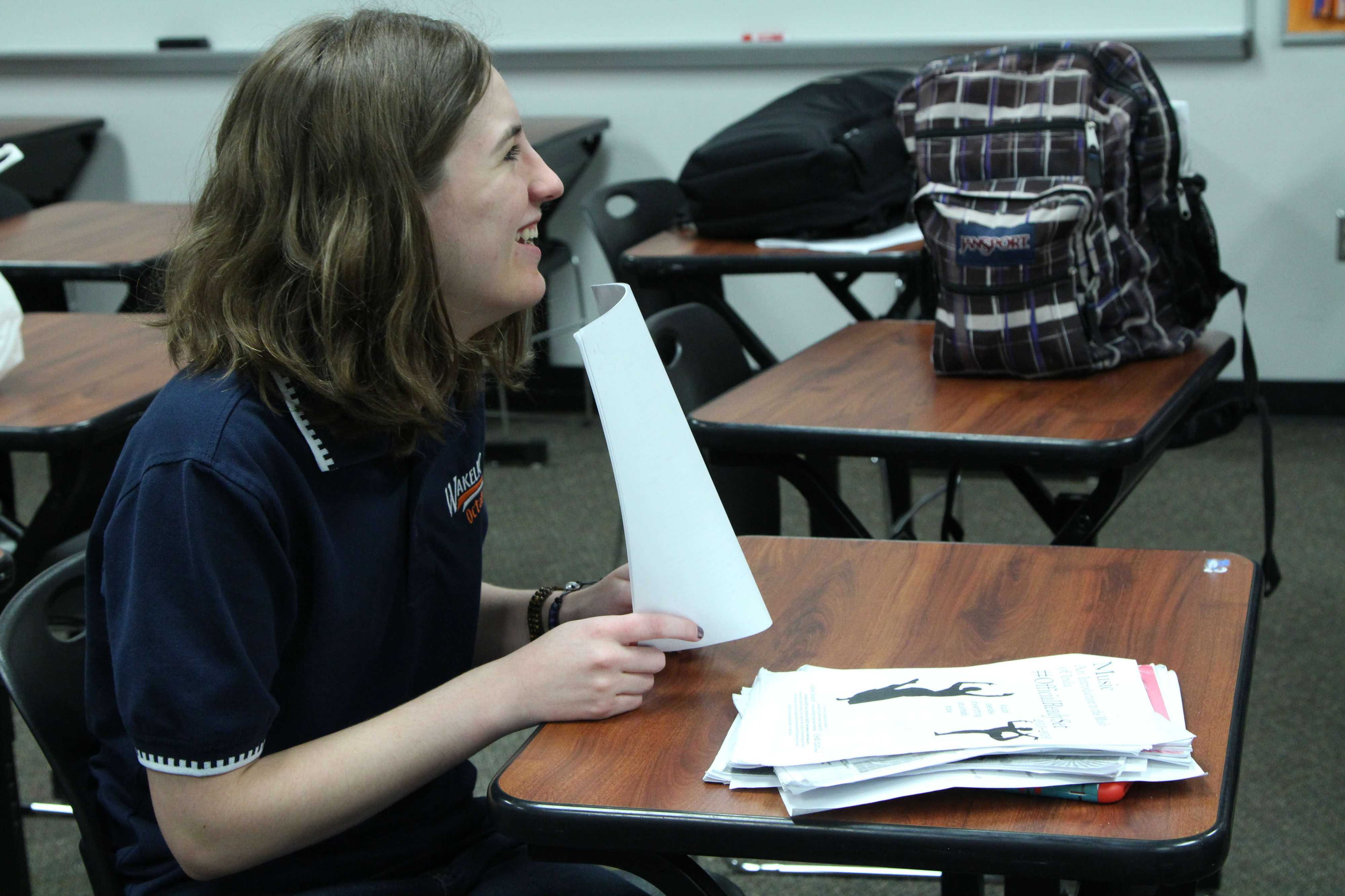 Sophomore Reece Walter laughs at a joke while cramming for her Octathlon test on
Social Science of India. “We were the only team that had fun,” Walter said. “The other coaches even asked us why were smiling so much.”