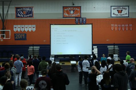 The Super Quiz took place in the auxiliary gym. At each team post, students had only seconds to talk over and write the answer to a question displayed on the screen that could be from any of the Academic Decathlon subjects. “Super quiz was challenging, and the tension to see who was winning was palpable. The best part of the experience was having that group effort at the end of a long day that let us celebrate something that we could be all proud of.” Chastain-Howley said.