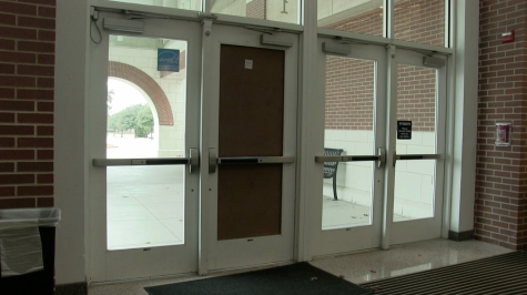 Front Door of Wakeland High School Shattered by Act of Vandalism