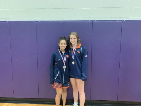 Female Wrestler Strives for Success with Achievements, Team Encouragement
