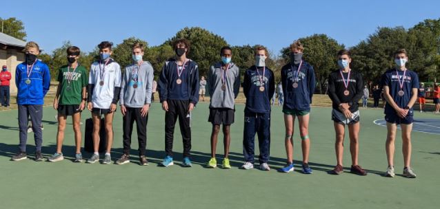 Enright, sixth from left, places eighth in state, breaks school and personal records