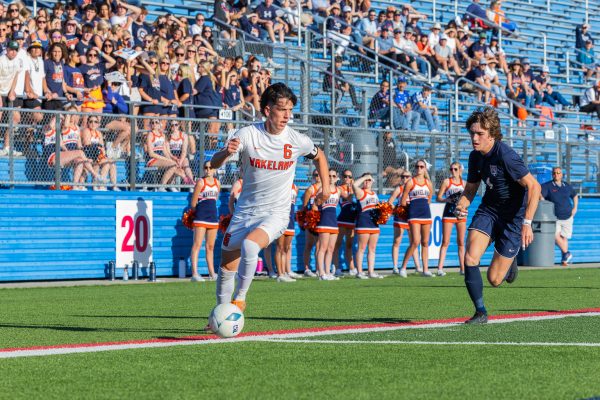 Senior midfielder Thomas Hayes makes a quick move past a defender against Leander Glenn High School in the state semifinals on Thursday, April 11.