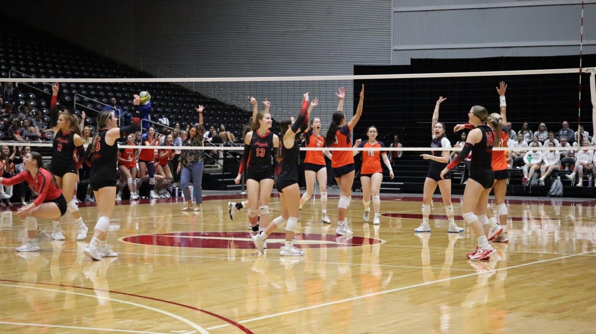 Victory awaits! The volleyball team secured a playoff seat for the first time in school history. Their hard work and dedication earned them a chance to compete in the state championship. Caption by Kinley Kelly