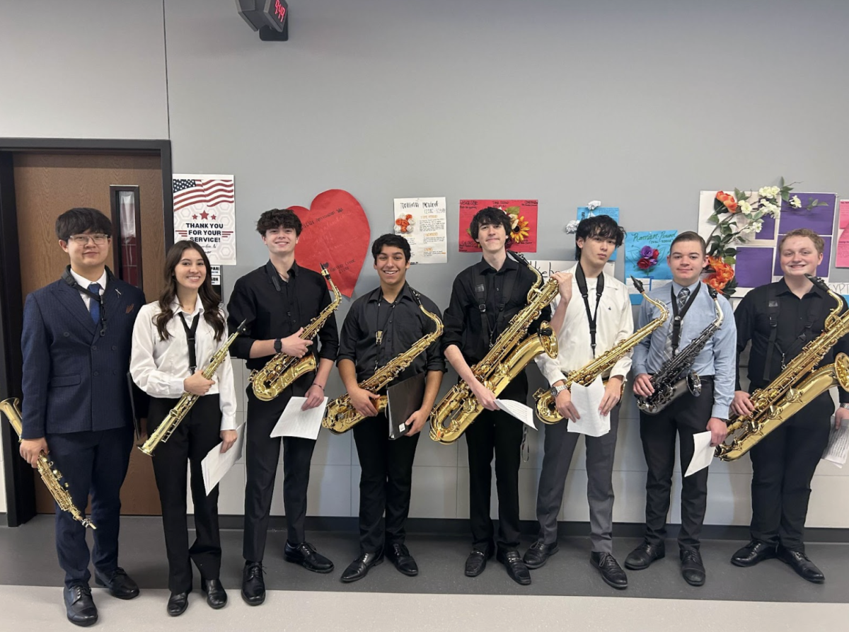 The 2023-2024 Wakeland Saxophone Choir after receiving a superior rating at the UIL Solo and Ensemble Contest. 

